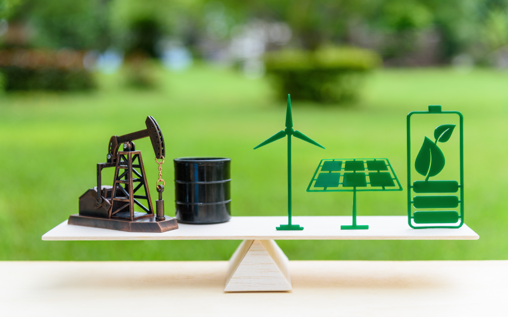 Image showing fossil fuels vs green energy sustainability weighed when balanced on a scale.